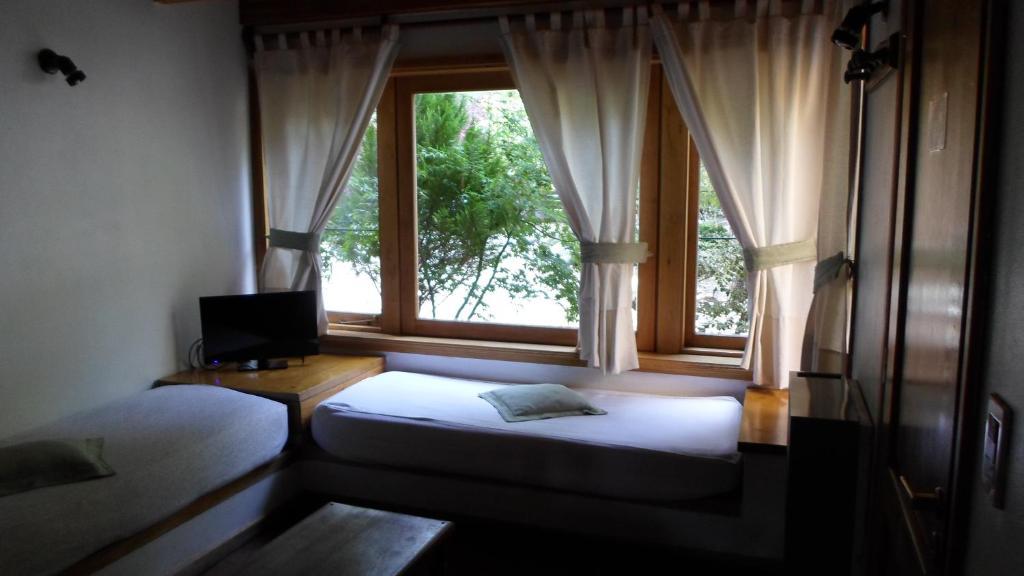 Apart Hotel Robles Del Sur San Martín de los Andes Rum bild